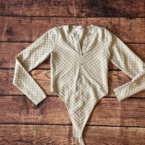 4th & Reckless Oralith checkerboard knit bodysuit.